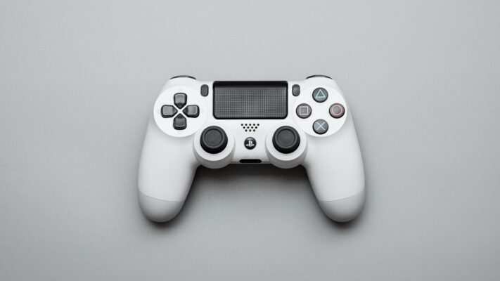 white and black game controller